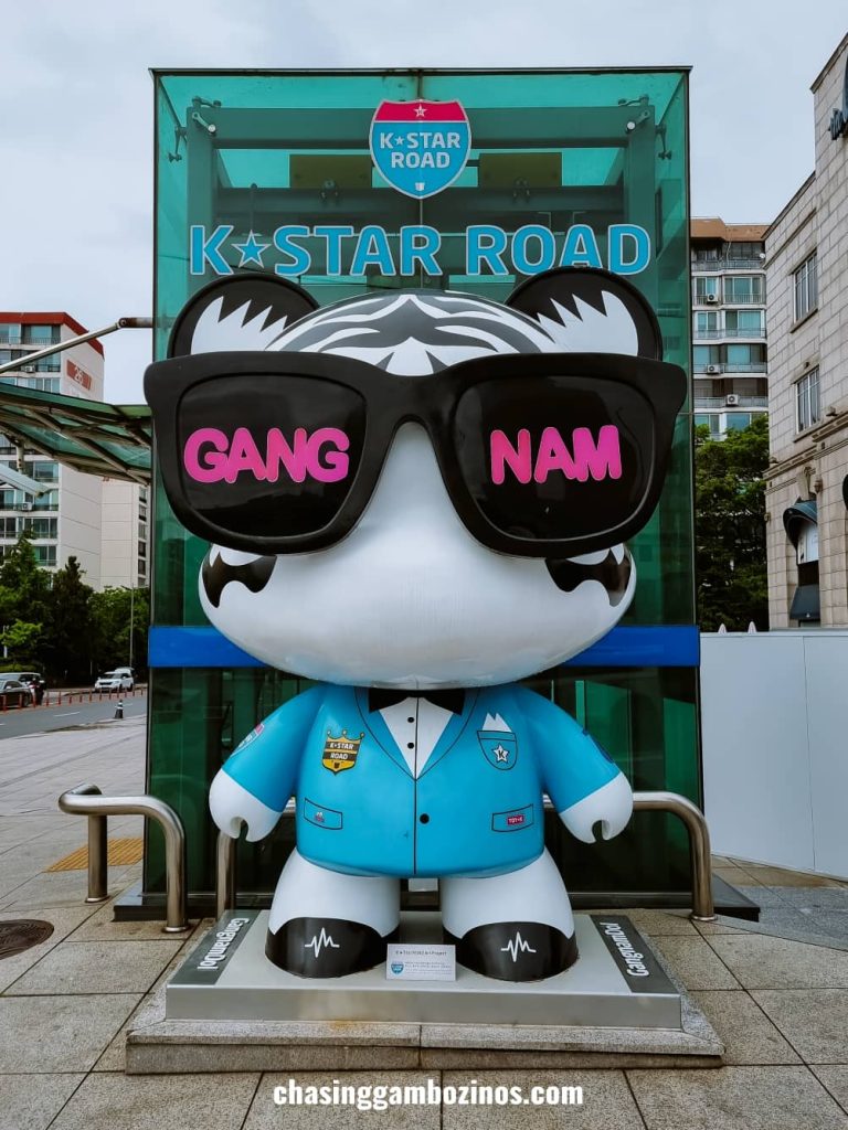 Teddy bear statue wearing glasses at the start of Gangnam K Pop Road in Seoul.