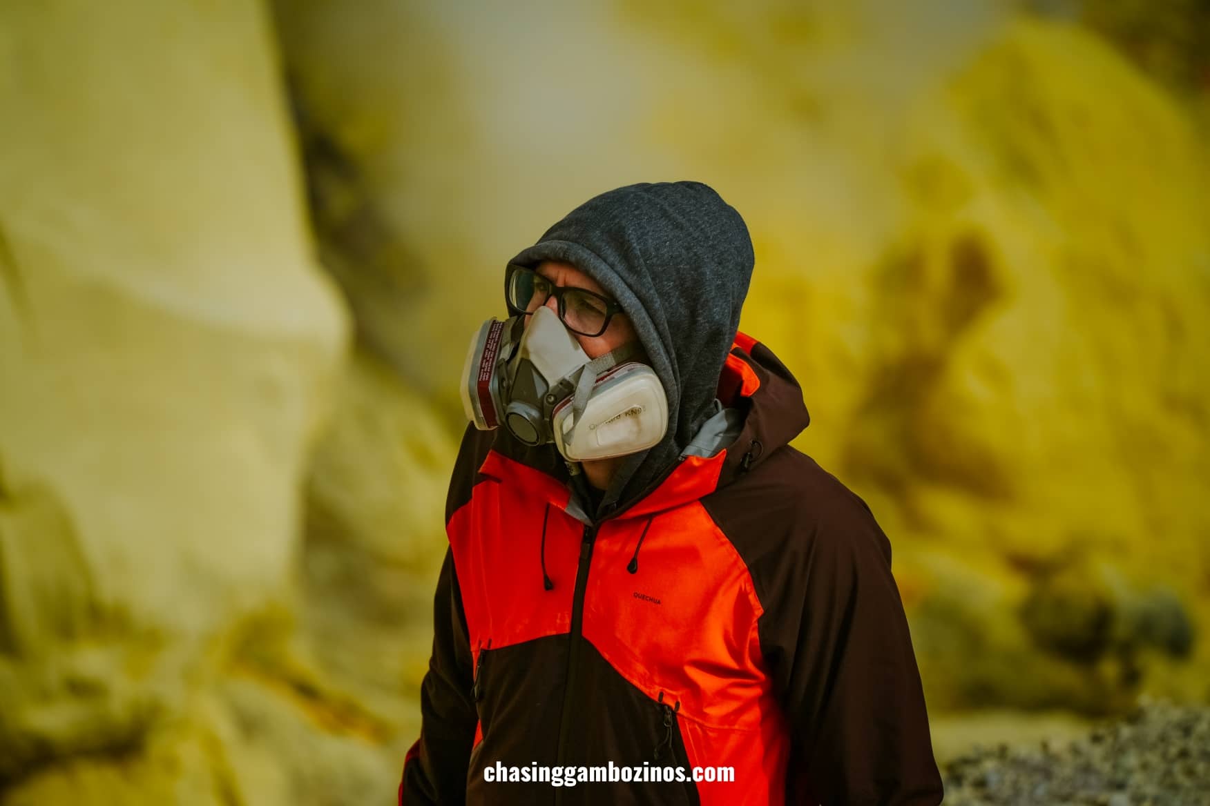 Man wearing a gas mask, which is essential during Mount Ijen hiking.