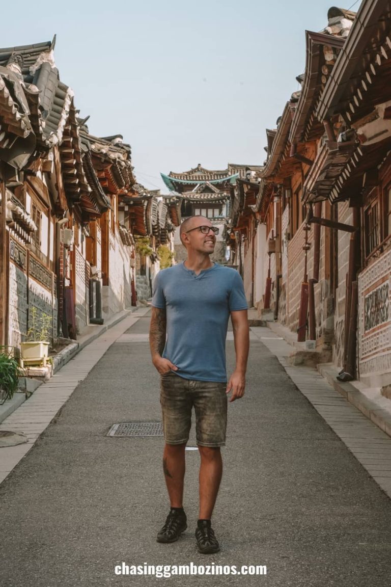 Man visiting Bukchon Hanok Village in Seoul.